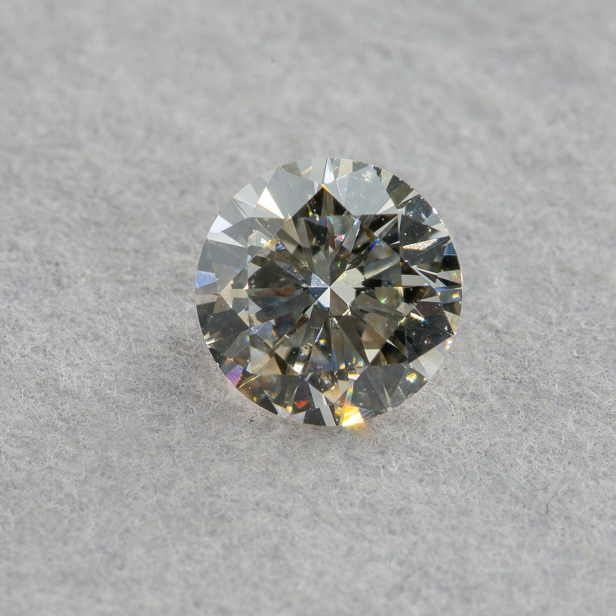 0.5 Carat Round Diamond, L, Faint Brown SI1, GIA Certified