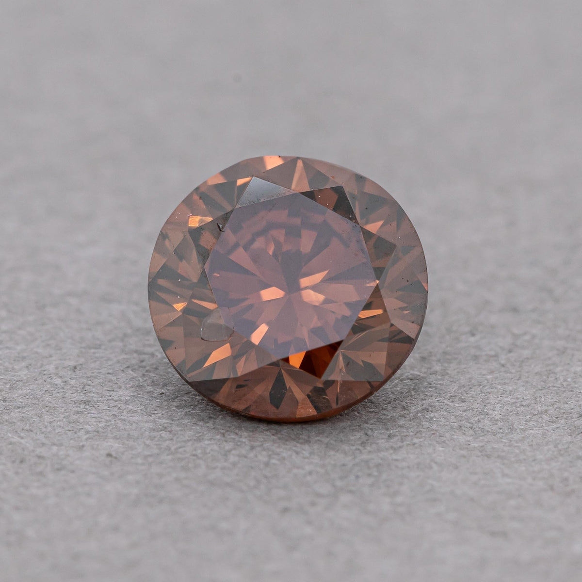 1.00 Carat Fancy Dark Orangy Brown Round Diamond, SI2, GIA Certified