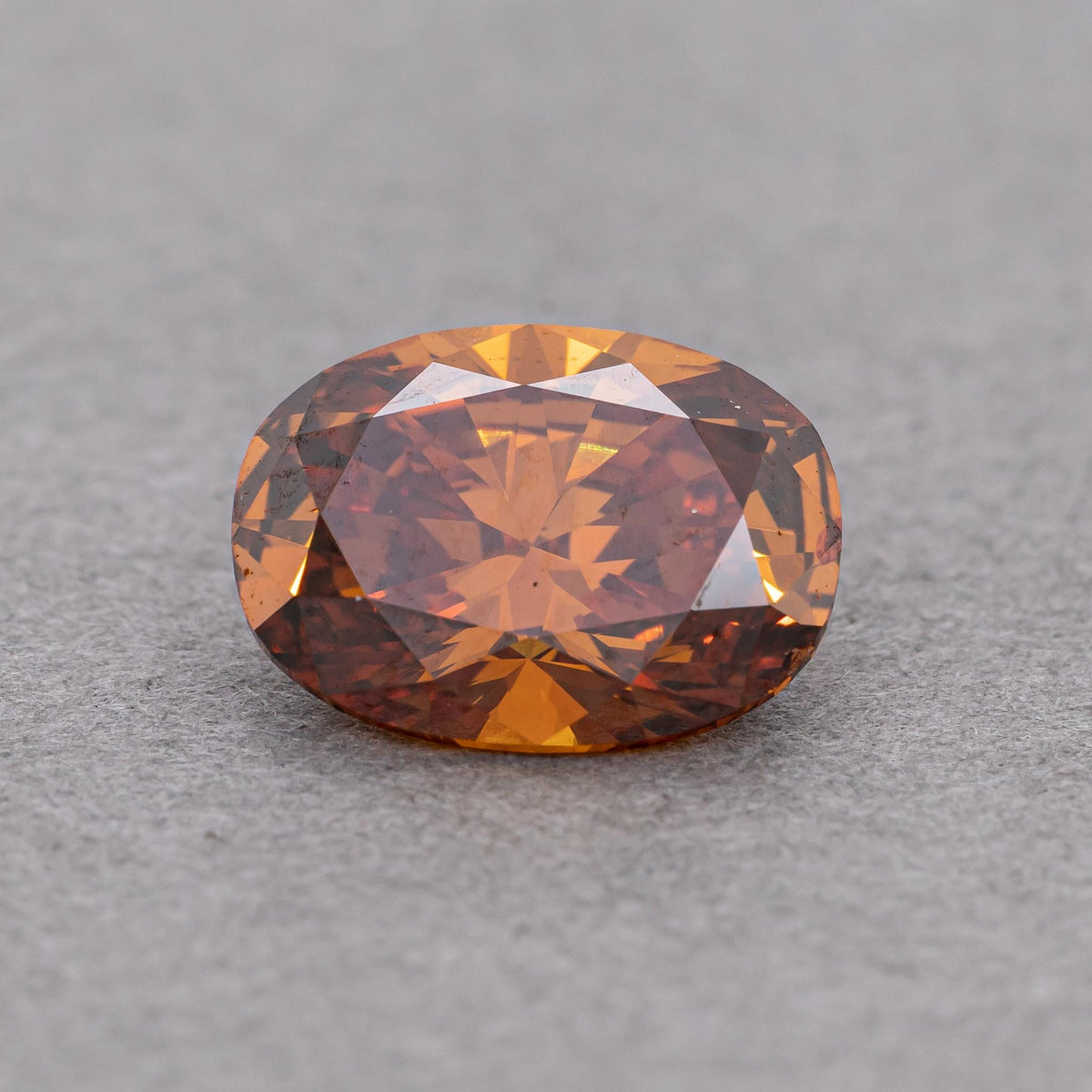1.12 Carat Fancy Deep Brownish Orange Oval Diamond, GIA Certified