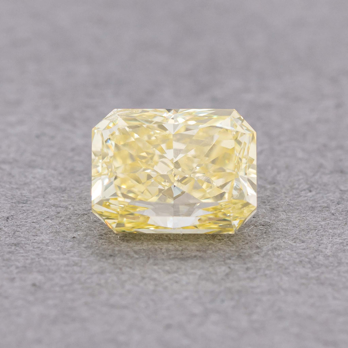 0.55 Carat Fancy Intense Yellow Radiant Diamond, SI2, GIA Certified