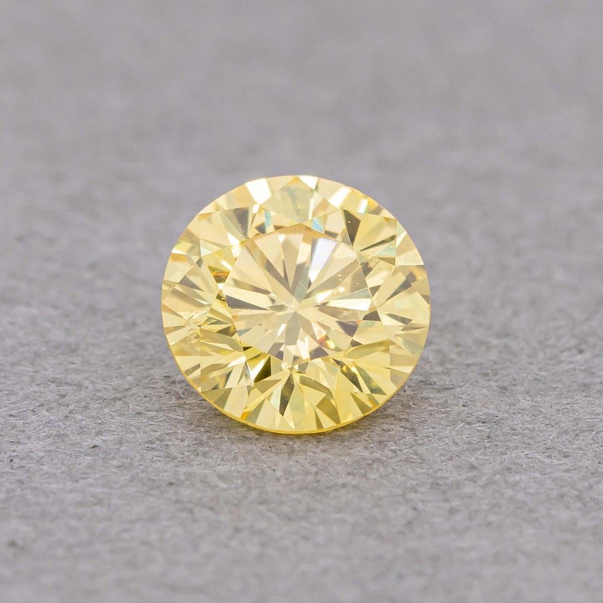 0.22 Carat Fancy Vivid Yellow Round Diamond, SI1, GIA Certified