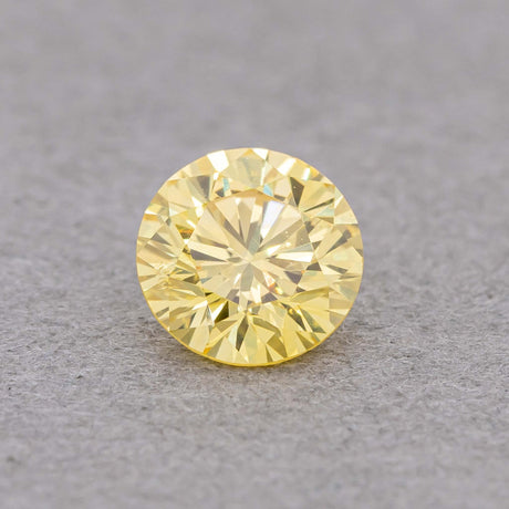 0.22 Carat Fancy Vivid Yellow Round Diamond, SI1 - loose diamond